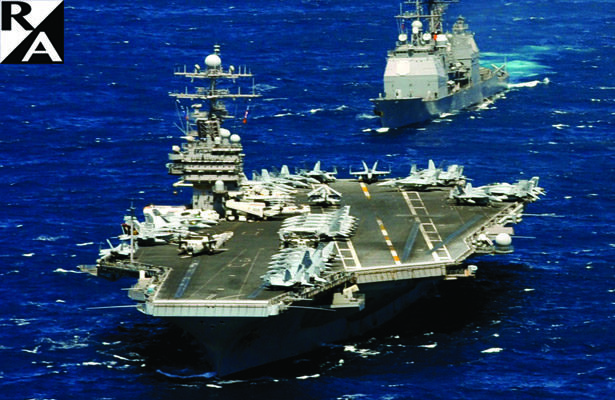 Carrier Commander Fired as 'Naive or Stupid': Navy Secretary says, 'Hold My Beer'